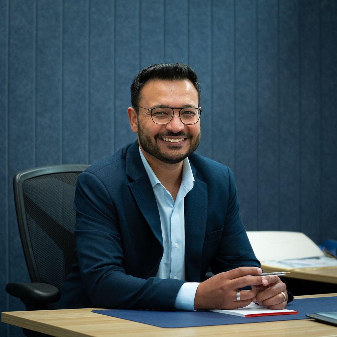 Mina Andrawis, Co-Founder and Partner of Medcentric, at his desk